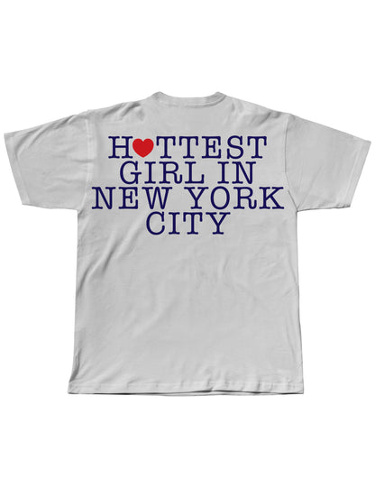 White t-shirt with 'Hottest Girl in New York City' text on a white background