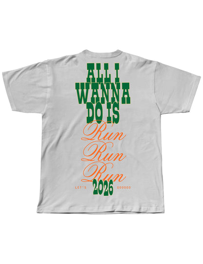 White t-shirt with green and orange text on a white background